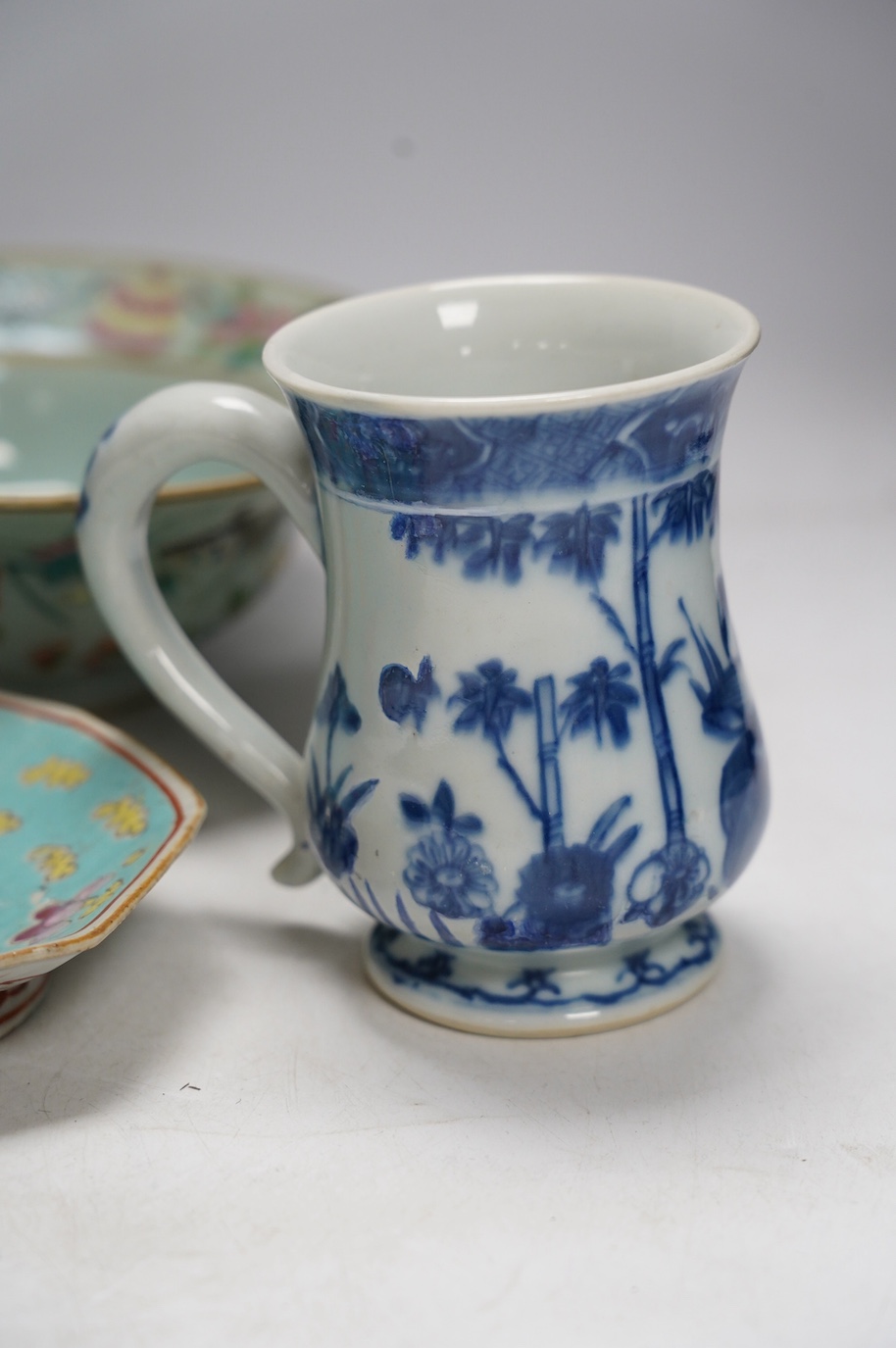 A Chinese blue and white Ming dynasty bowl, a blue and white mug and two pieces of famille rose (4), tallest 12cm. Condition - good